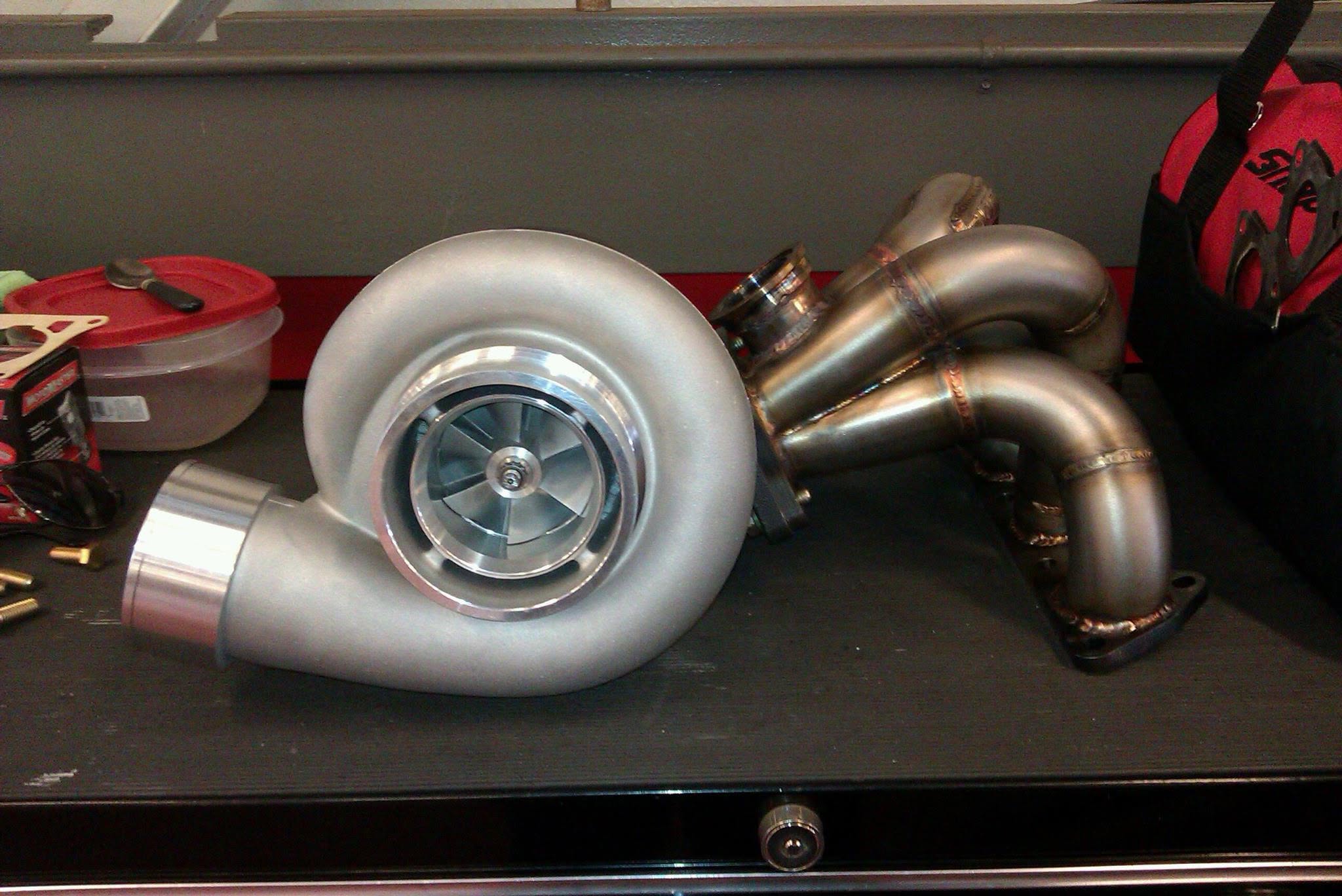 Large turbocharger with custom fabricated piping