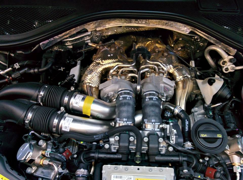 Detailed twin-turbo installation in an engine bay